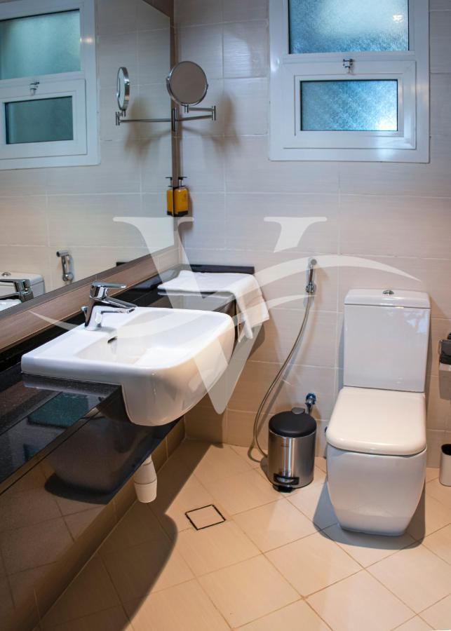 Viola Hotel Apartments Sharjah Bagian luar foto