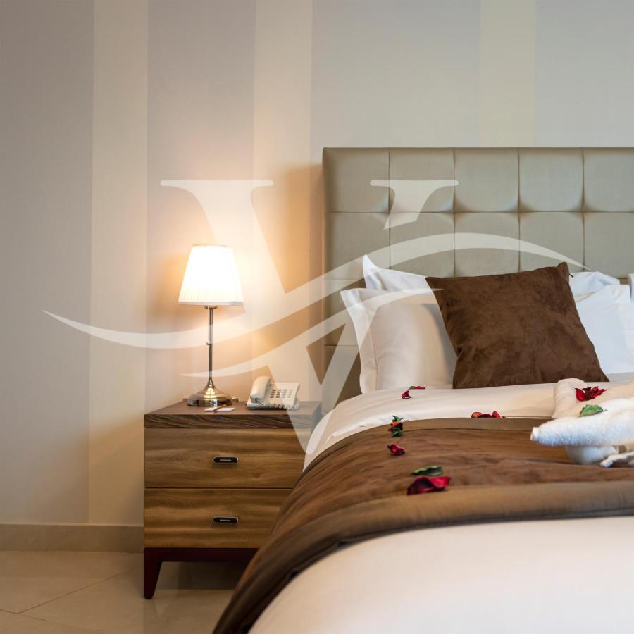 Viola Hotel Apartments Sharjah Bagian luar foto