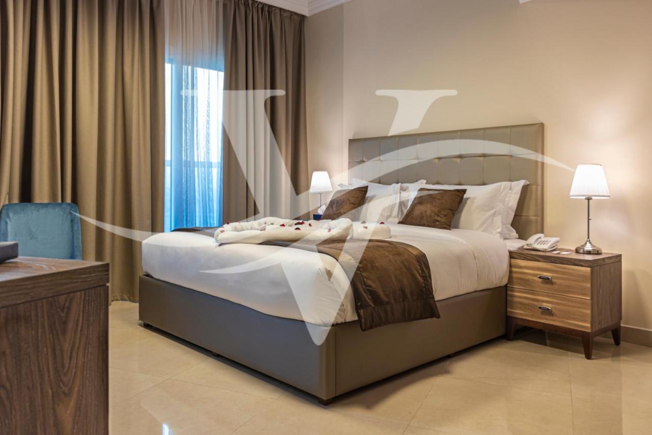 Viola Hotel Apartments Sharjah Bagian luar foto