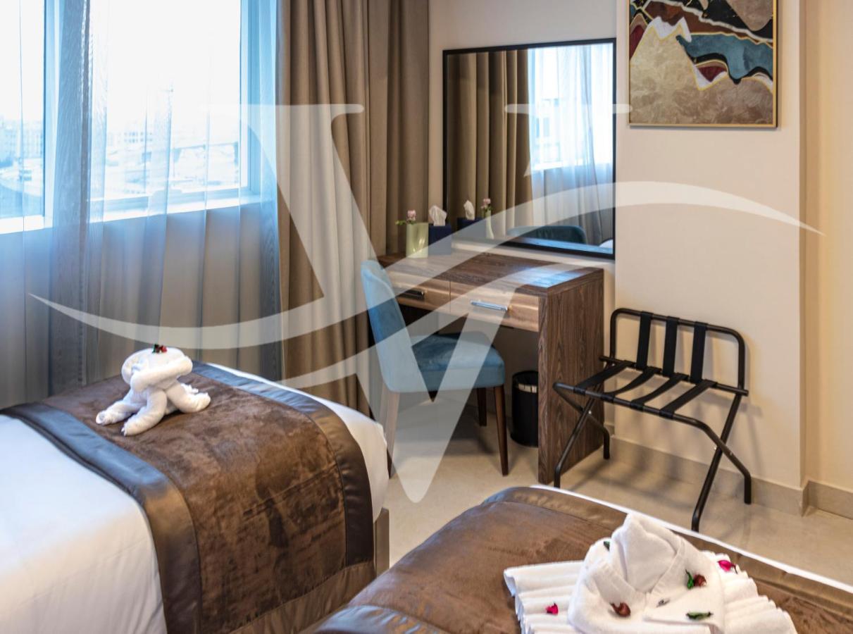 Viola Hotel Apartments Sharjah Bagian luar foto