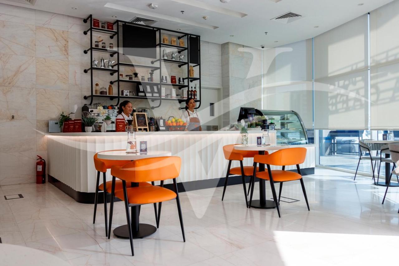 Viola Hotel Apartments Sharjah Bagian luar foto